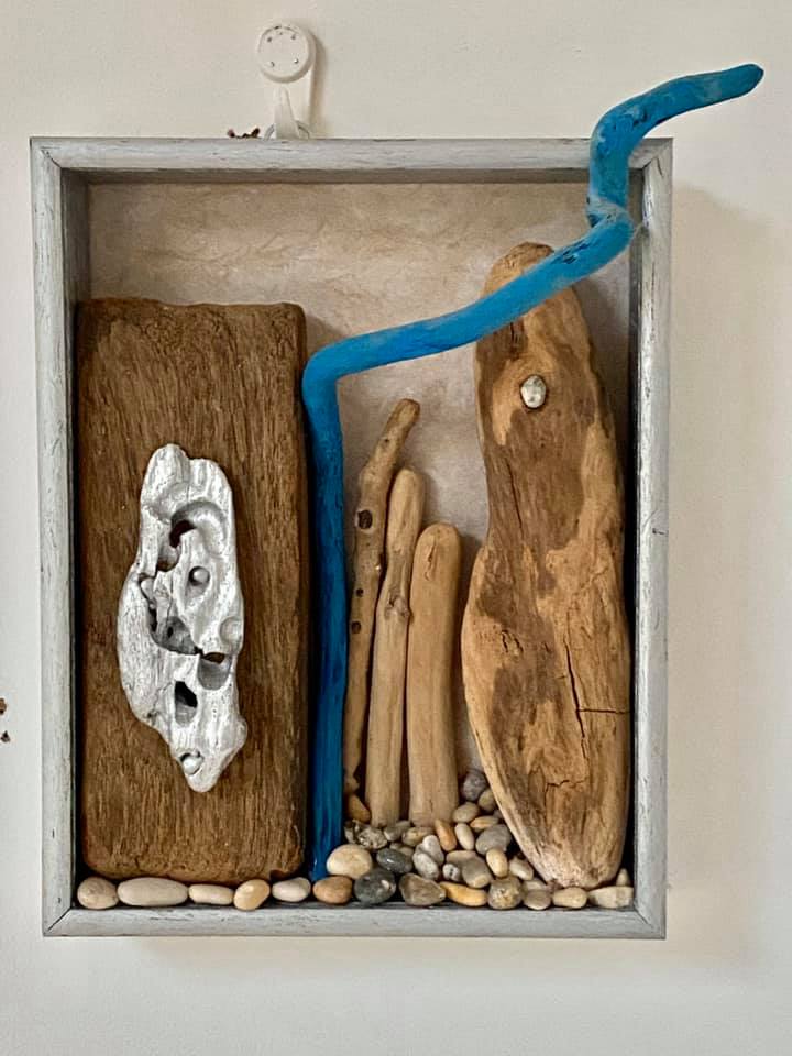 A sculpture made from recycled and natural materials