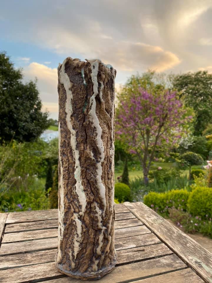 A sculpture made from recycled and natural materials